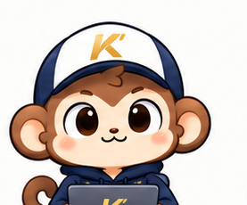 K’ Monkey mascot using a laptop